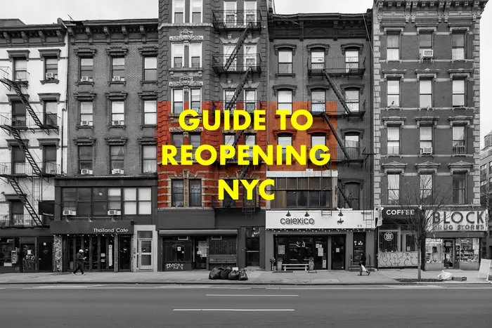 Buildings in the East Village with the words Guide to Reopening NYC over it